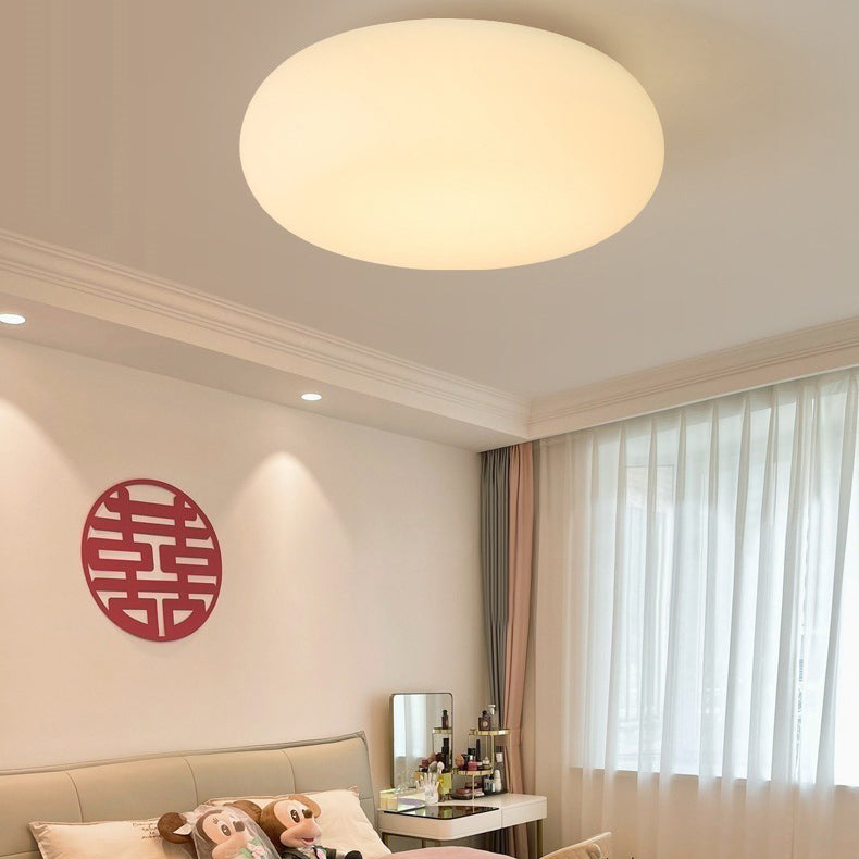 Sleek Modern Minimalist Oval Iron LED Flush Mount Ceiling Light with PE Finish for Bedroom