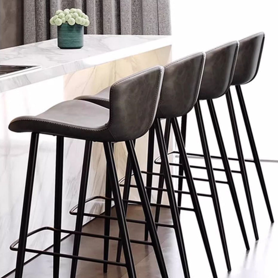 Contemporary Scandinavian Curved Faux Leather Bar Stool with Carbon Steel Frame, High-Leg Design & Footrest for Dining Room