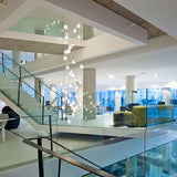 Luxurious Crystal Orb Staircase Chandelier with LED Ball Shade - Modern Loft Lighting