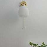 Nordic-Style Milk-White Striped Glass Wall Sconce with Brass Finish - 1-Light Pull-Cord Lamp