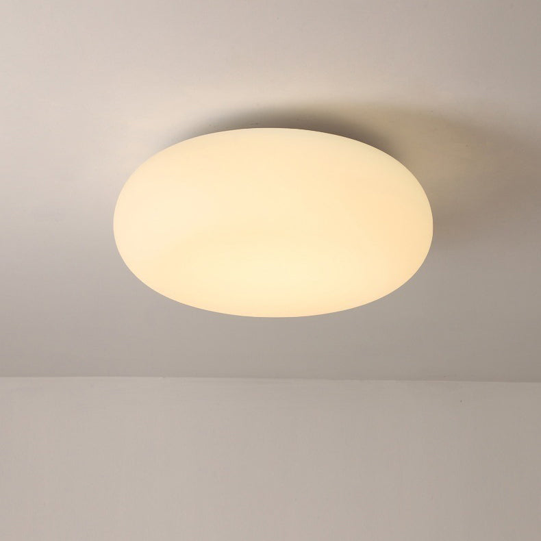 Sleek Modern Minimalist Oval Iron LED Flush Mount Ceiling Light with PE Finish for Bedroom