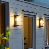 Solar-Powered Wall Lamp with a Modern Metal and Glass Body