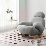 Modern Minimalist Curved Rocking Chair with Faux Rabbit Fur Upholstery, Down-Filled Cushions, Silk-Cotton Fabric, and Solid Wood Frame – Living Room