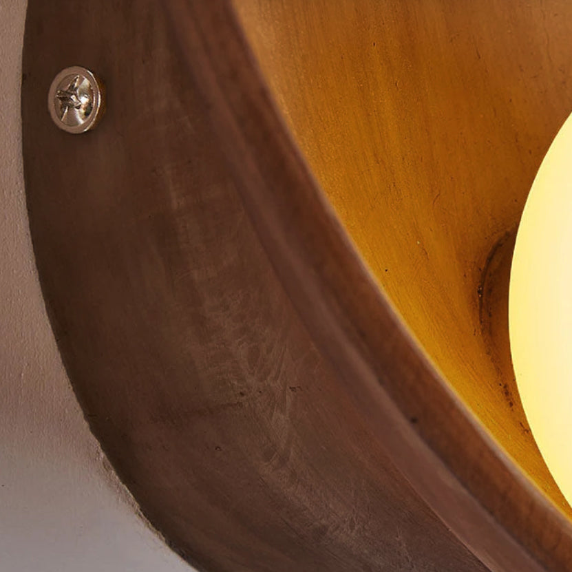 Sleek Modern Round Iron and Resin 1-Light Wall Sconce Lamp