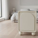 Modern Scandinavian Cream Nightstand with One Cabinet – Sculpted Arch Door & Ball-Legged Bedside Table for the Bedroom