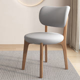 Contemporary Scandinavian Oak Dining Chair with Faux Leather Upholstery and Round-Curved Backrest – Ideal for Dining Rooms