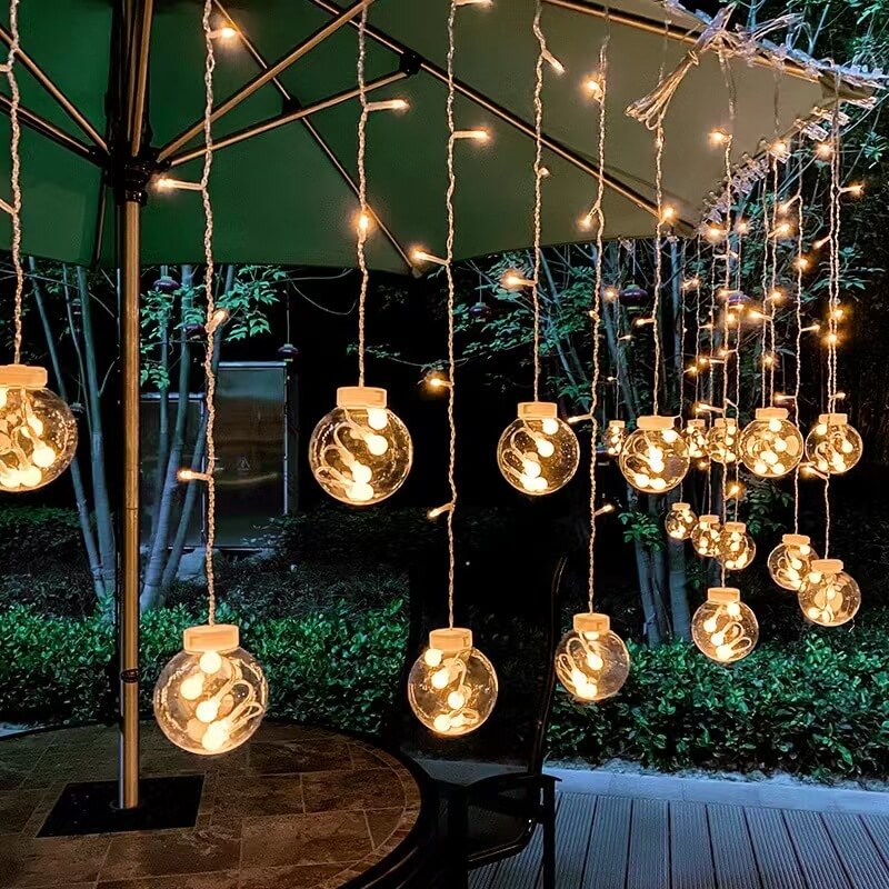 Solar-Powered LED Curtain Lights – Star & Moon Design, Outdoor Christmas String Lights for Patio, Garden and Camping