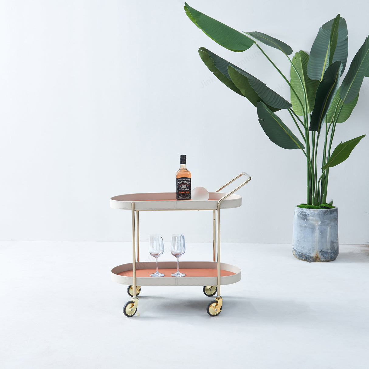 Portable Oval Faux Saddle Leather Side Table with a Gold Stainless Steel Frame — Innovative Rolling Dual-Tier Drink Trolley for the Dining Room