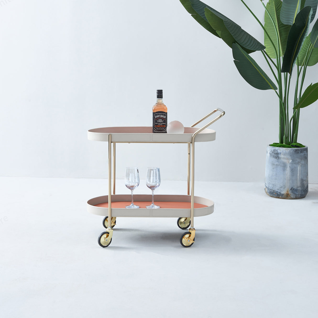 Portable Oval Faux Saddle Leather Side Table with a Gold Stainless Steel Frame — Innovative Rolling Dual-Tier Drink Trolley for the Dining Room