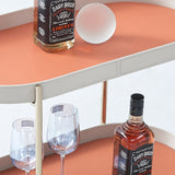 Portable Oval Faux Saddle Leather Side Table with a Gold Stainless Steel Frame — Innovative Rolling Dual-Tier Drink Trolley for the Dining Room